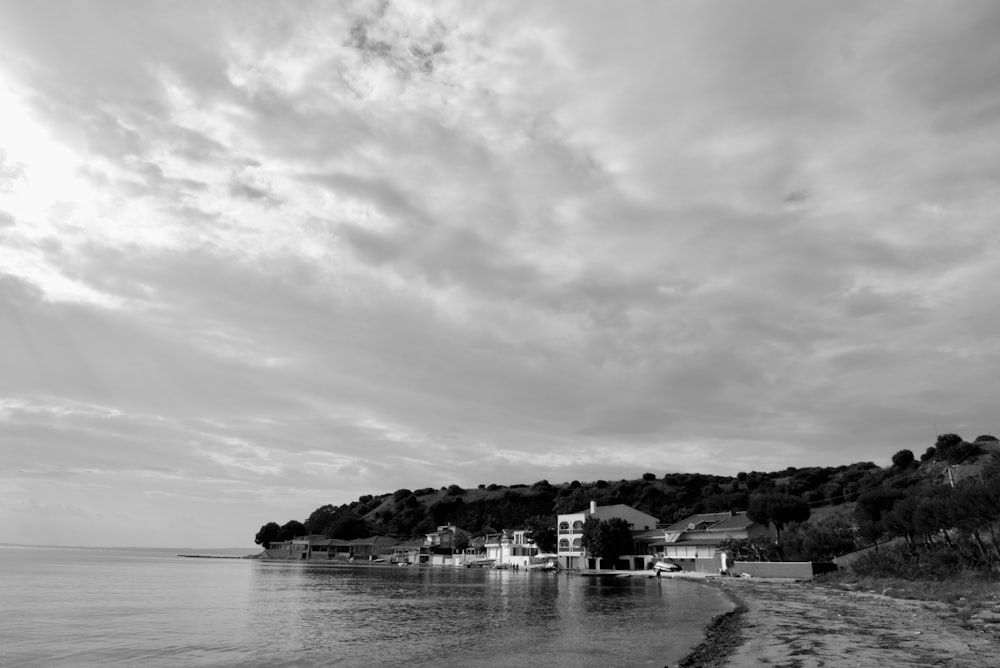 a black and white photo of a beach