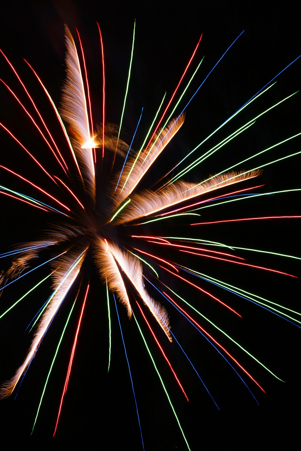 a colorful fireworks display in the night sky