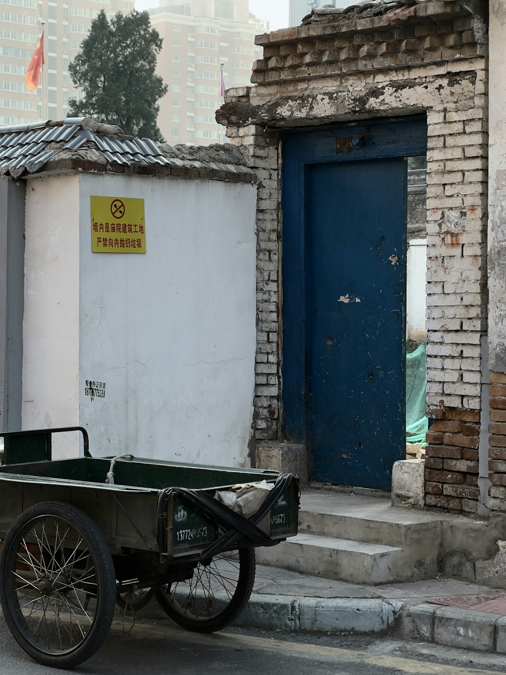 an old car parked in front of a building