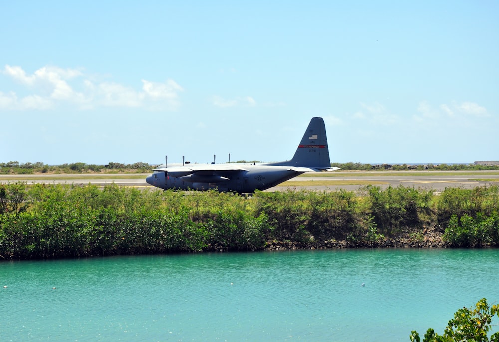 a plane flying over a body of water