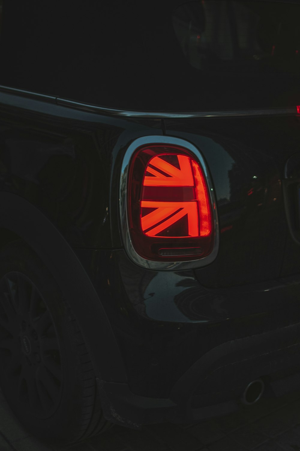 a close up of the tail light of a car