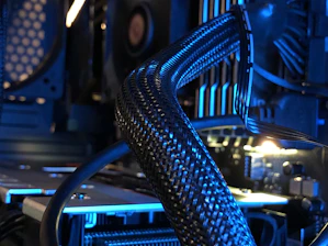 a close up of a computer with many wires