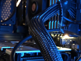 a close up of a computer with many wires