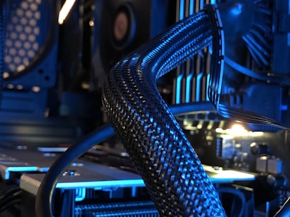 a close up of a computer with many wires