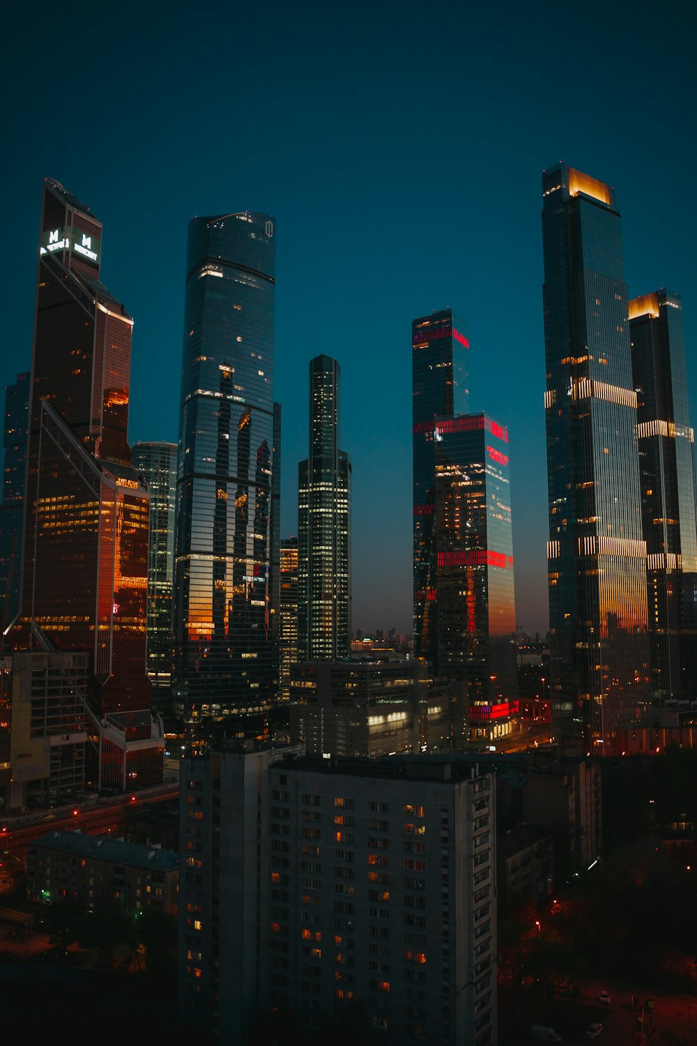 a view of a city at night from the top of a building