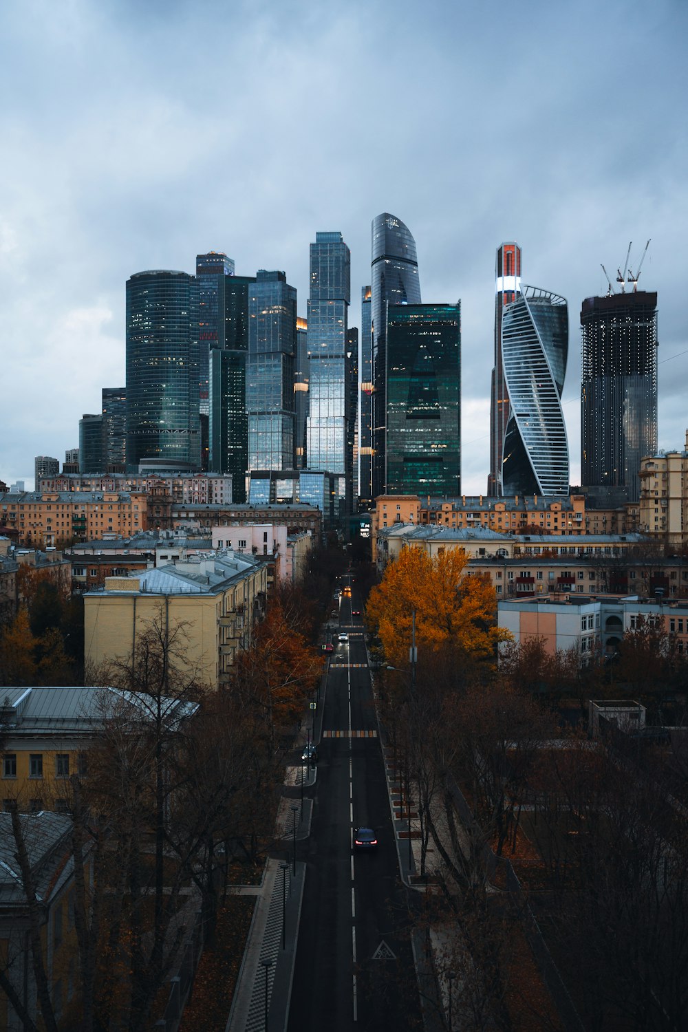 a view of a city with tall buildings