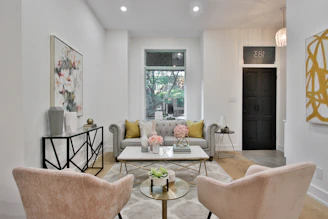 a living room filled with furniture and a fire place