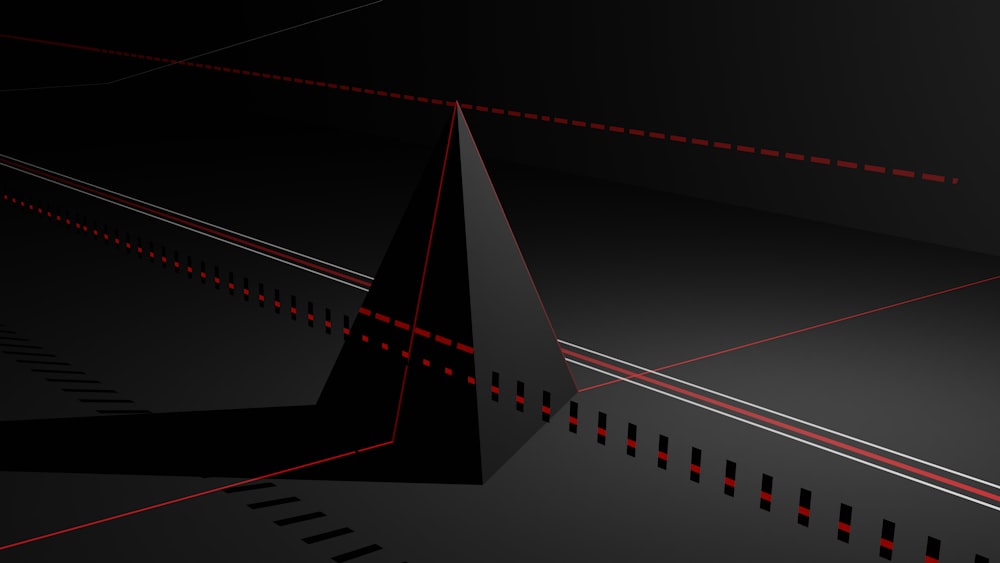 a black background with red lines and a triangle