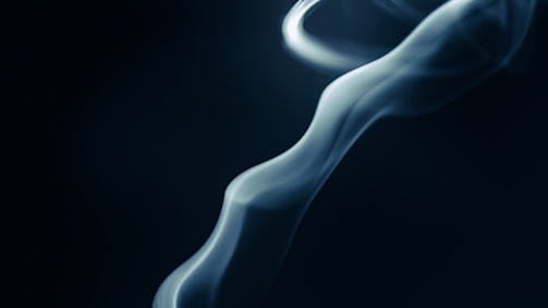 A swirling, semi-transparent wave-like form set against a dark background, with smooth gradients and soft curves.