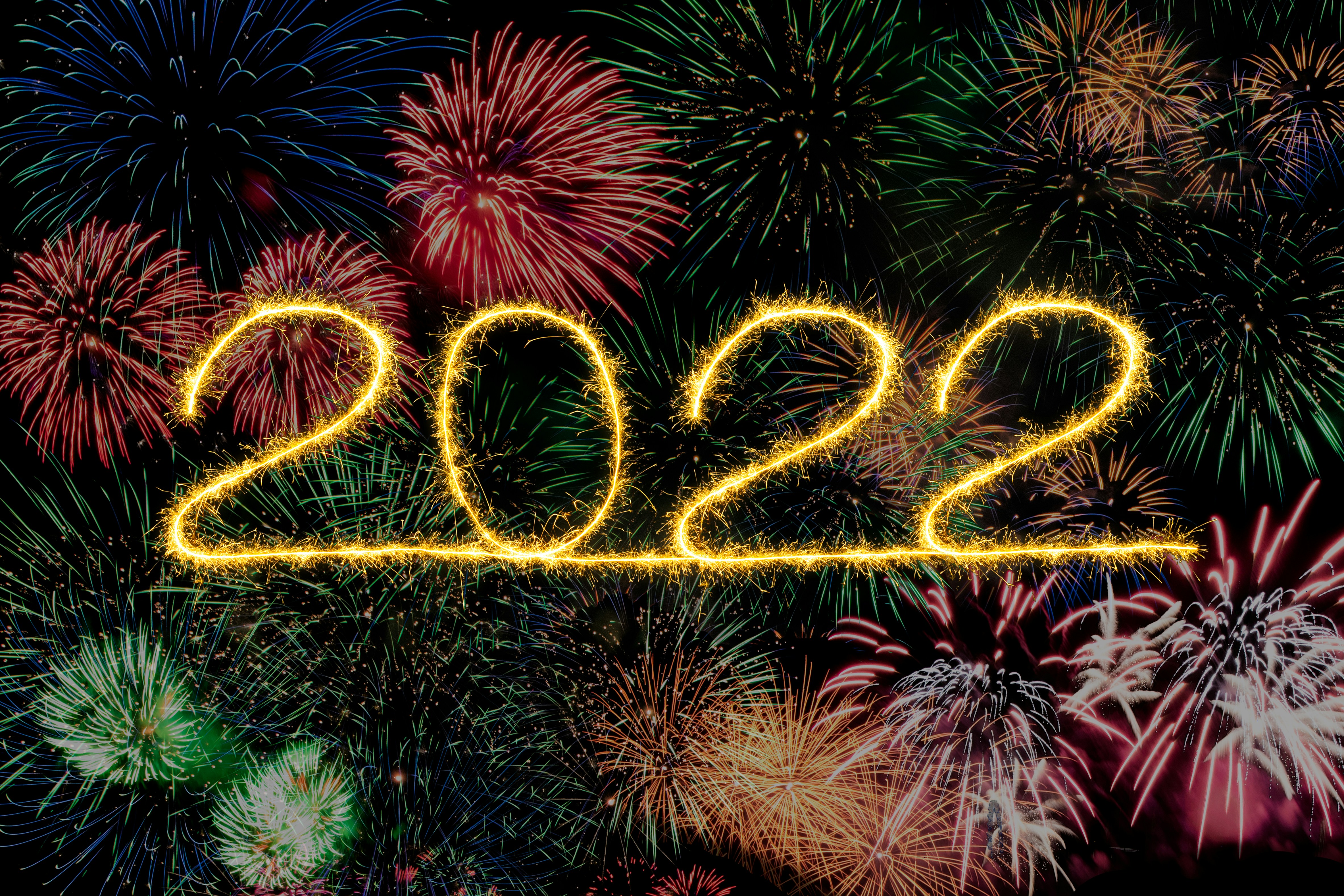 2022 painted with sparkslers, lightpainting background with fireworks