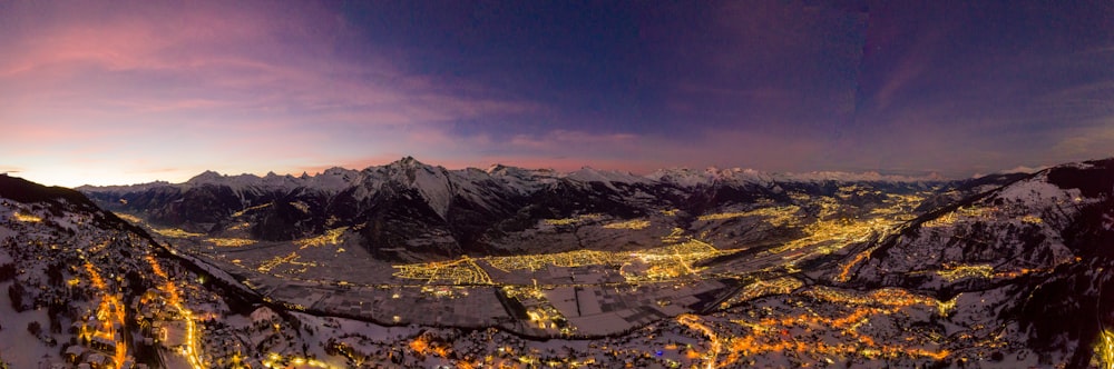 a night view of a snowy mountain range