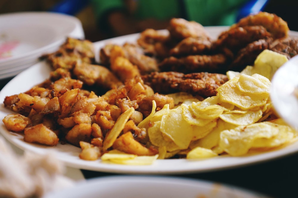 a white plate topped with lots of different types of food