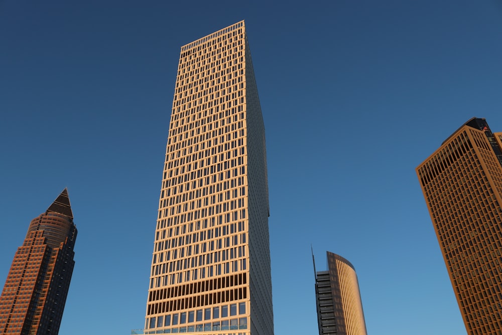 a group of tall buildings sitting next to each other