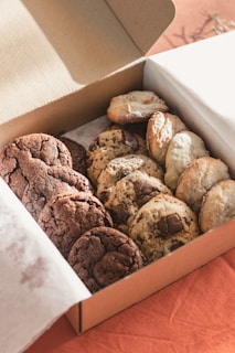 a box filled with chocolate cookies and cookies