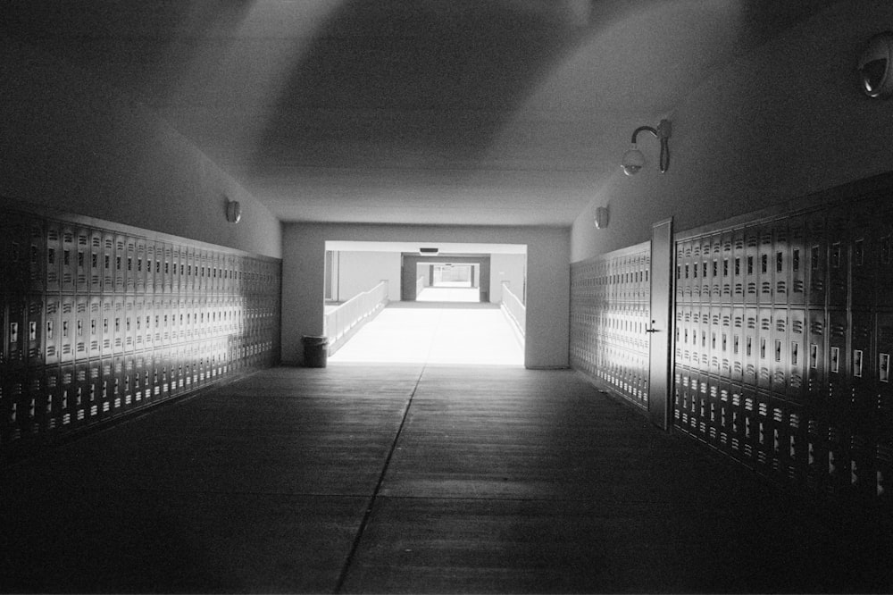 a long hallway with a bunch of mail boxes