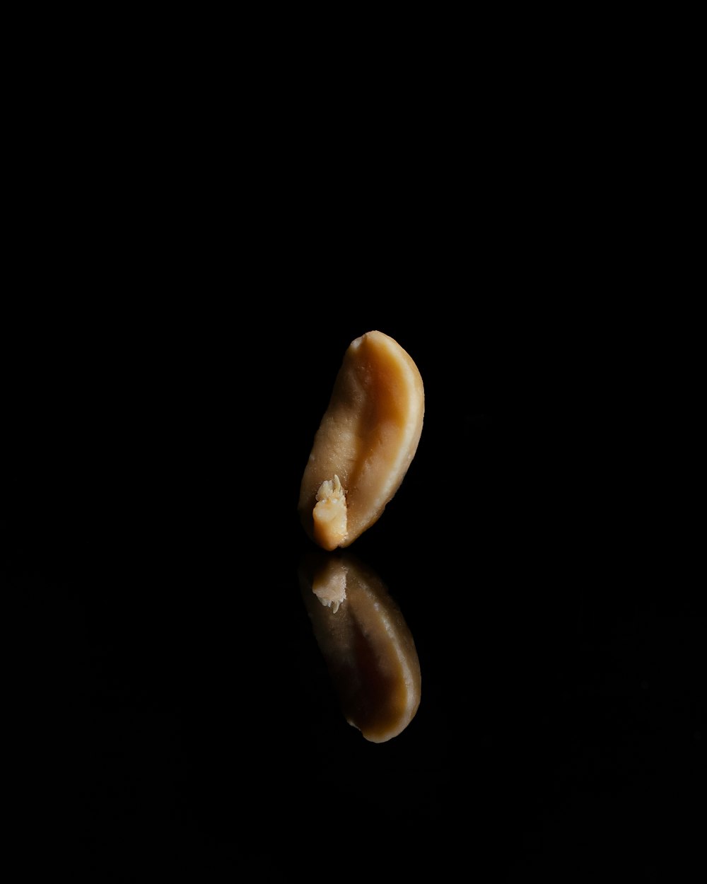 a peeled banana sitting on top of a table