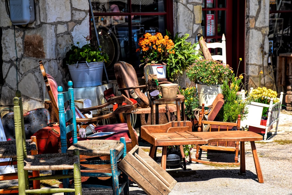 a number of chairs and tables outside of a building