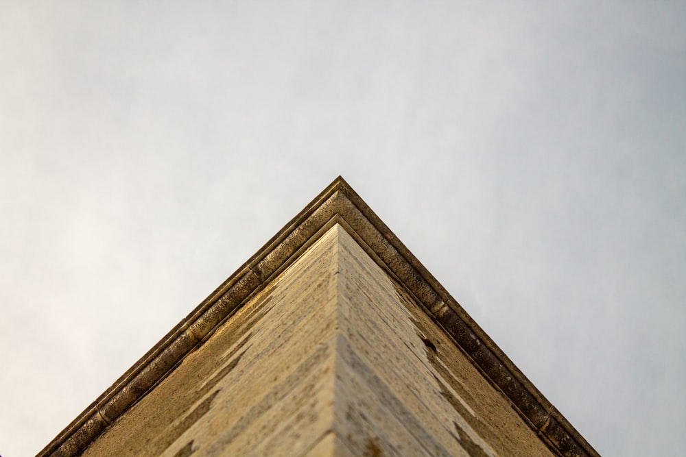 a tall building with a clock on the top of it