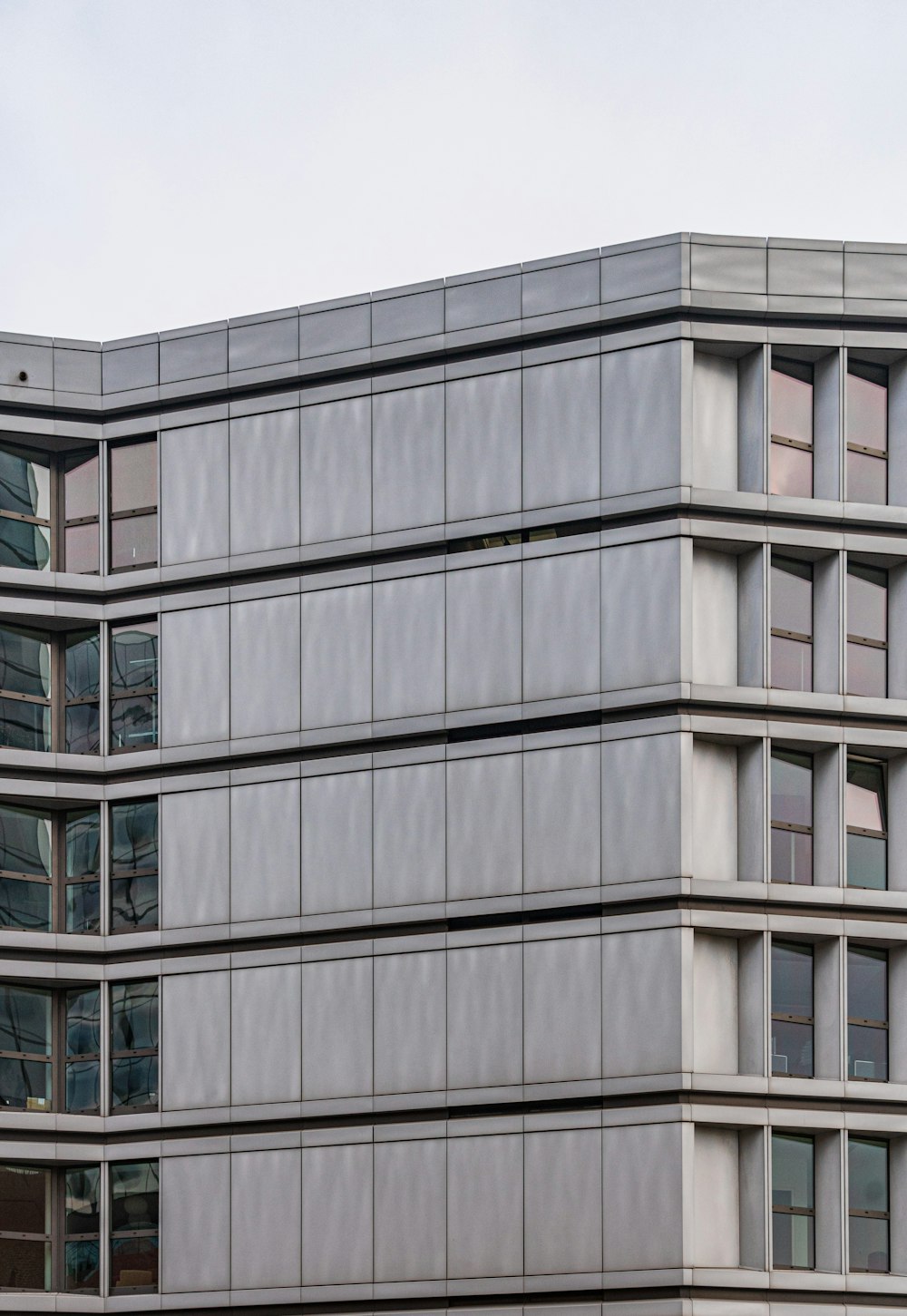 a large building with a clock on the side of it