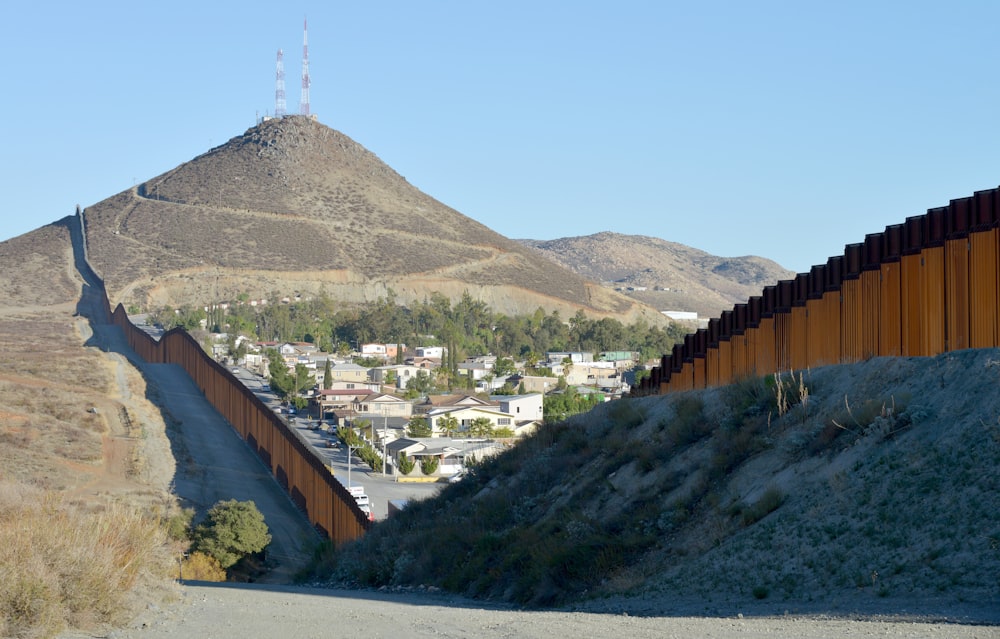 a view of a mountain and a city from a distance