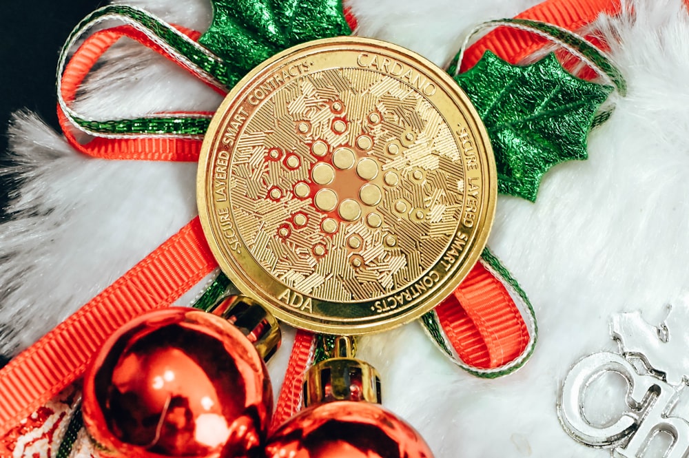 a close up of a christmas ornament on a furry surface