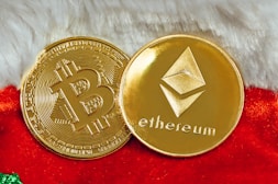 a close up of a gold bit coin