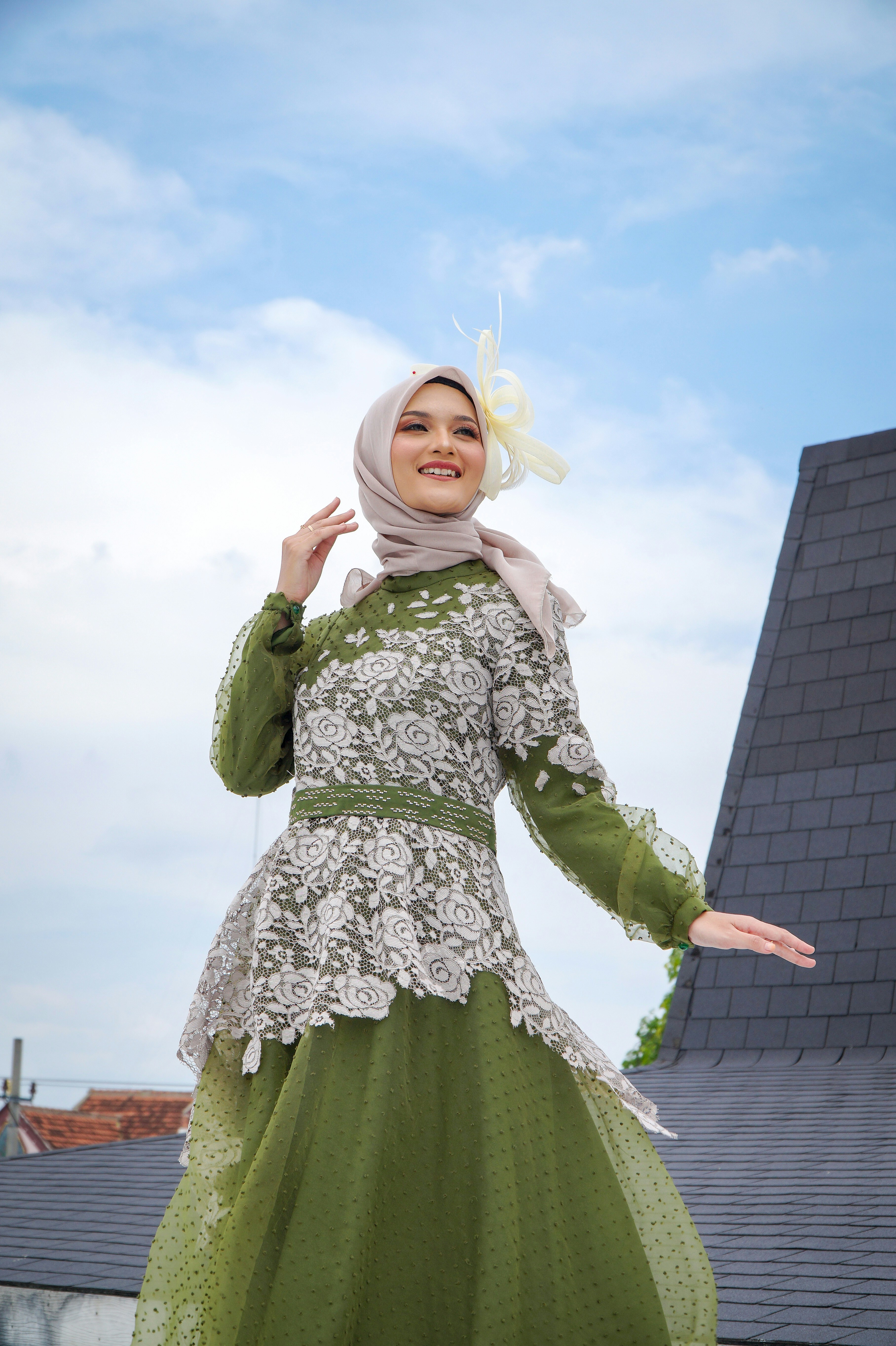 A woman wearing a green dress and a hijab photo – Free Indonesia Image ...