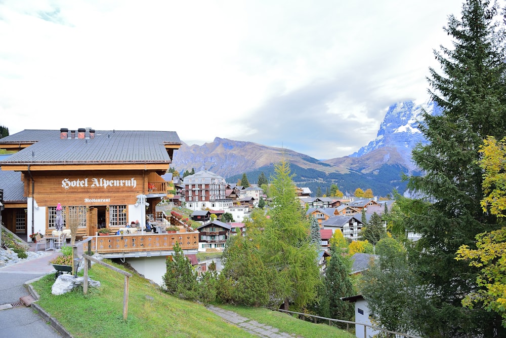 a small town with mountains in the background