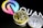 A close-up of two cryptocurrency coins, one gold-colored featuring the TRON (TRX) symbol and the other silver-colored with intricate designs, placed against a background displaying a colorful logo and partial text.