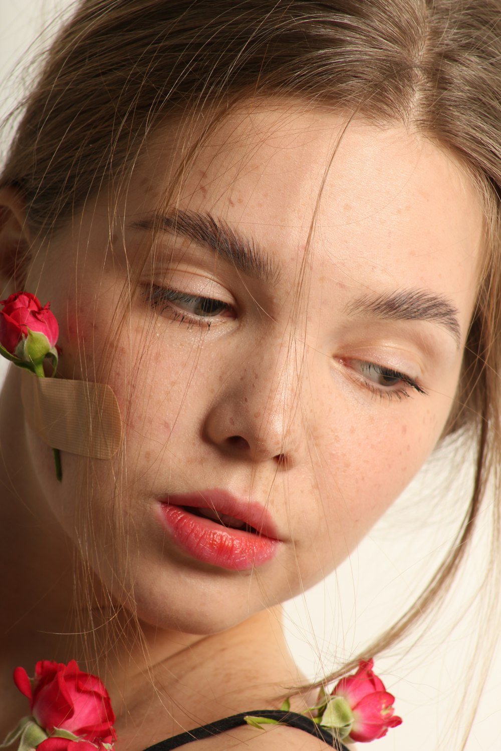 a woman with a flower in her hair