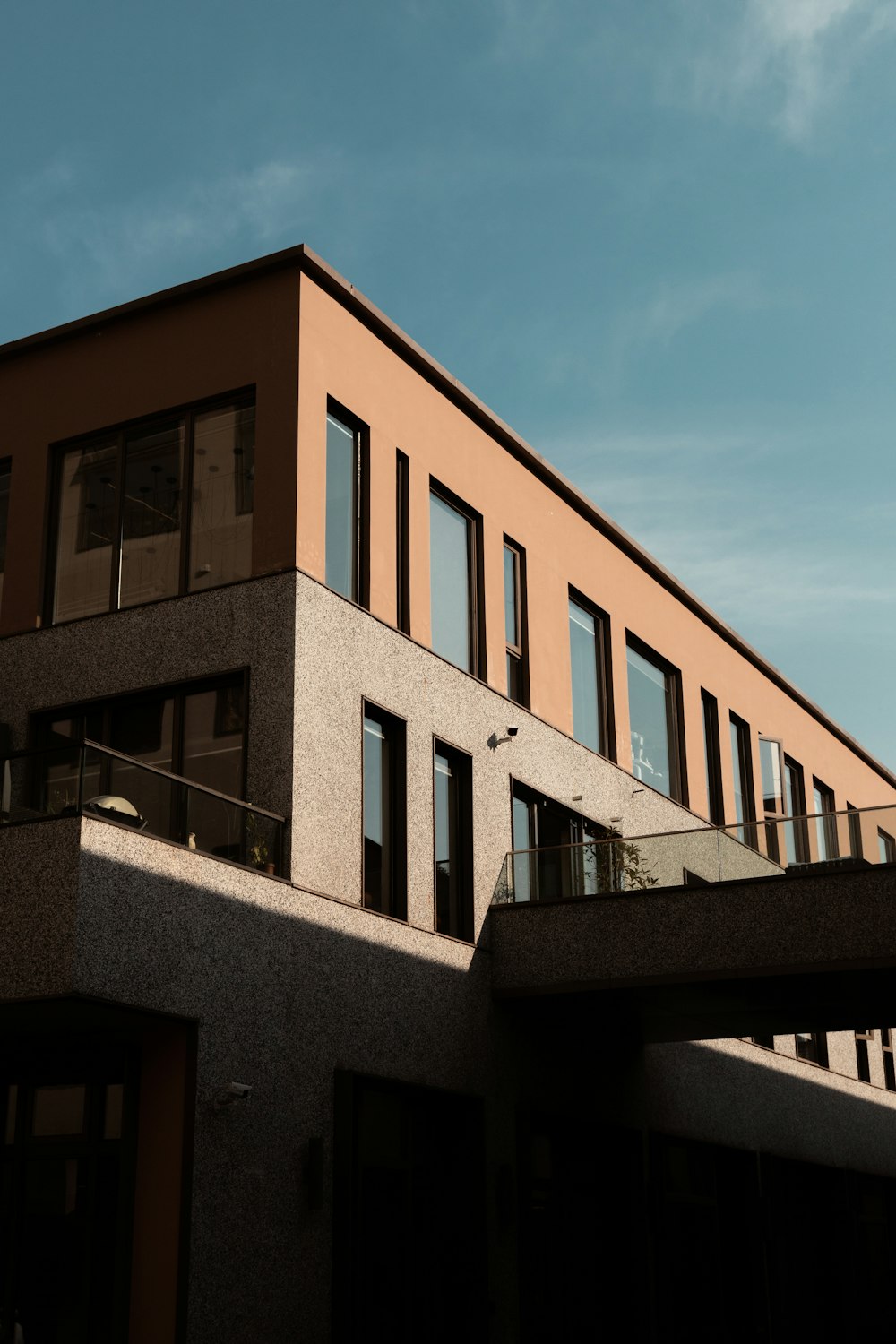 a tall building with a balcony and balconies