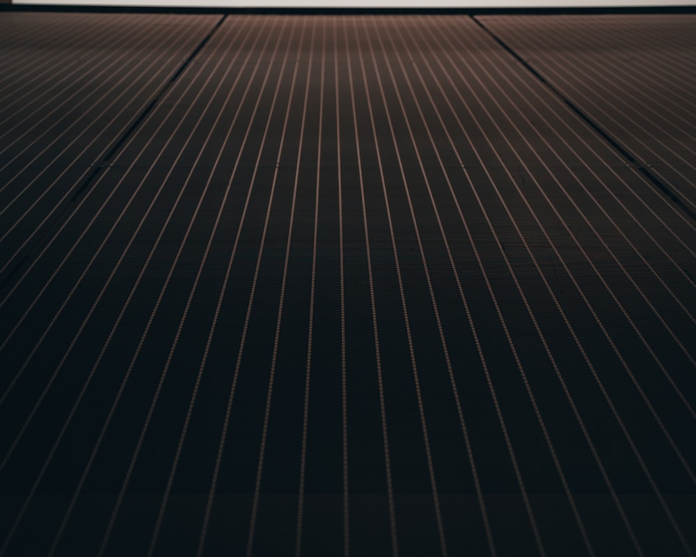 a black and white photo of a room with lines on the floor