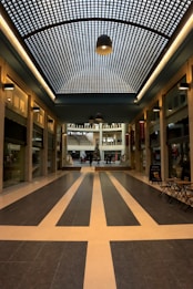 a large room with a checkered floor and ceiling
