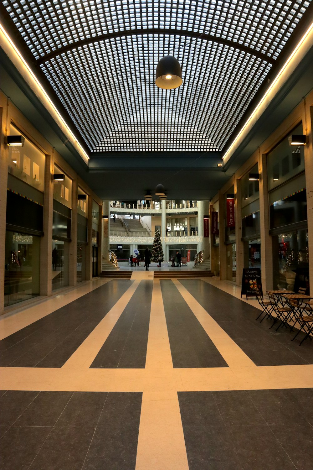 a large room with a checkered floor and ceiling