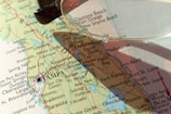 a map with a pair of glasses on top of it