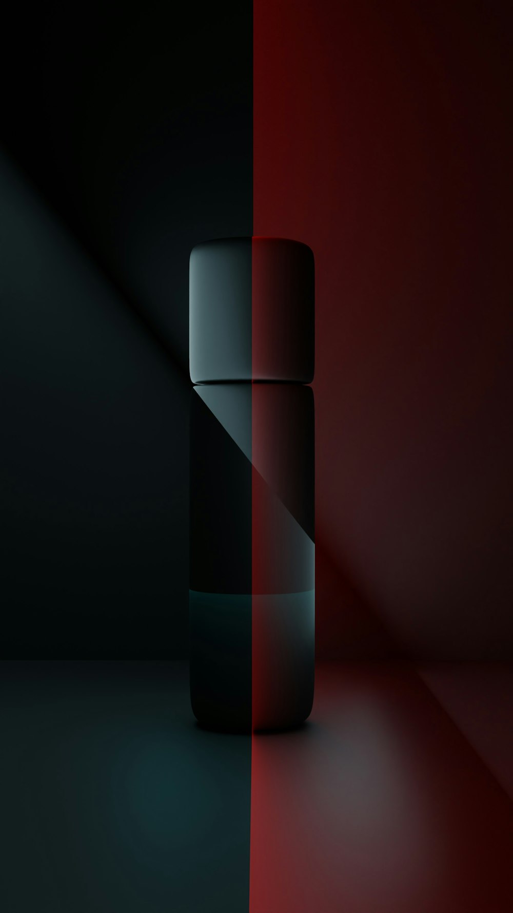 a black and red background with a bottle