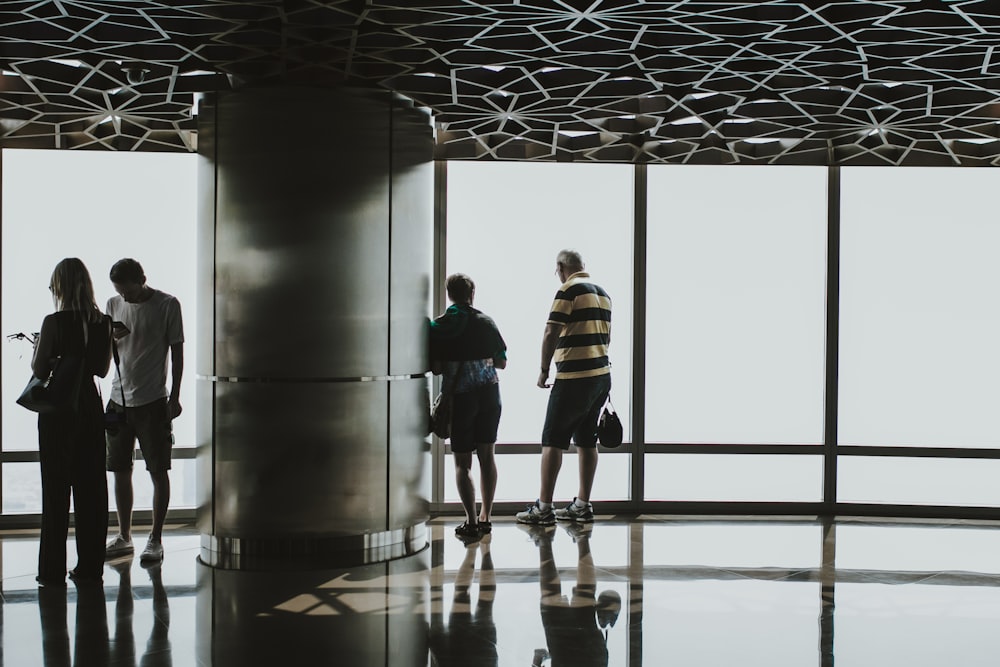 a group of people standing next to each other