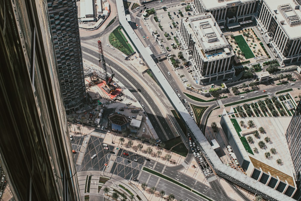 an aerial view of a city with tall buildings