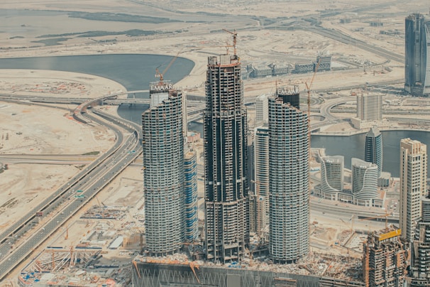 a large group of tall buildings under construction