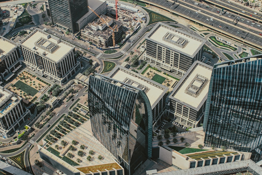 an aerial view of a city with a lot of tall buildings