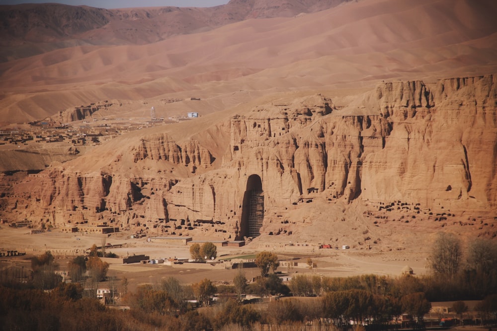 a desert landscape with mountains in the background