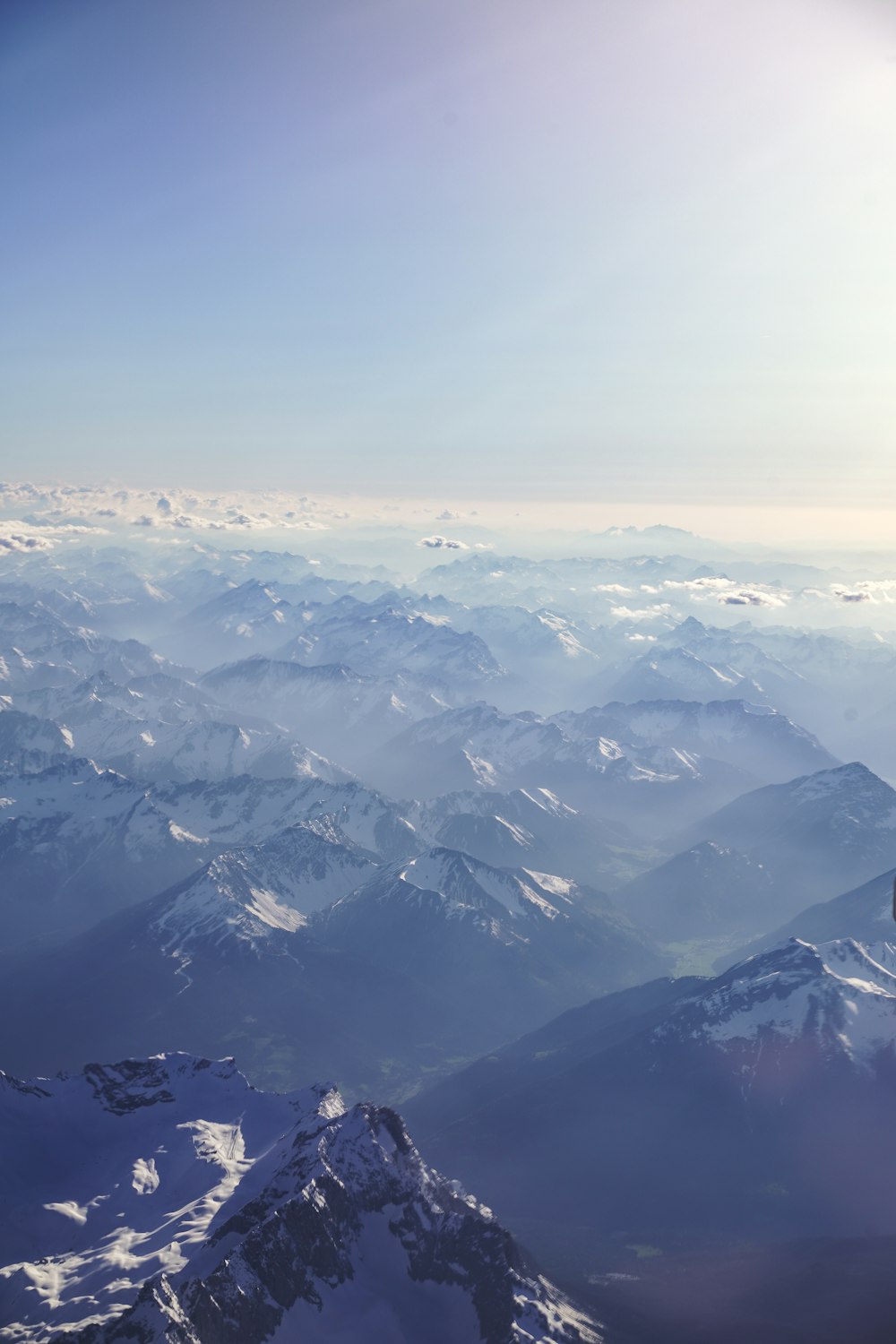 a view of a mountain range from an airplane