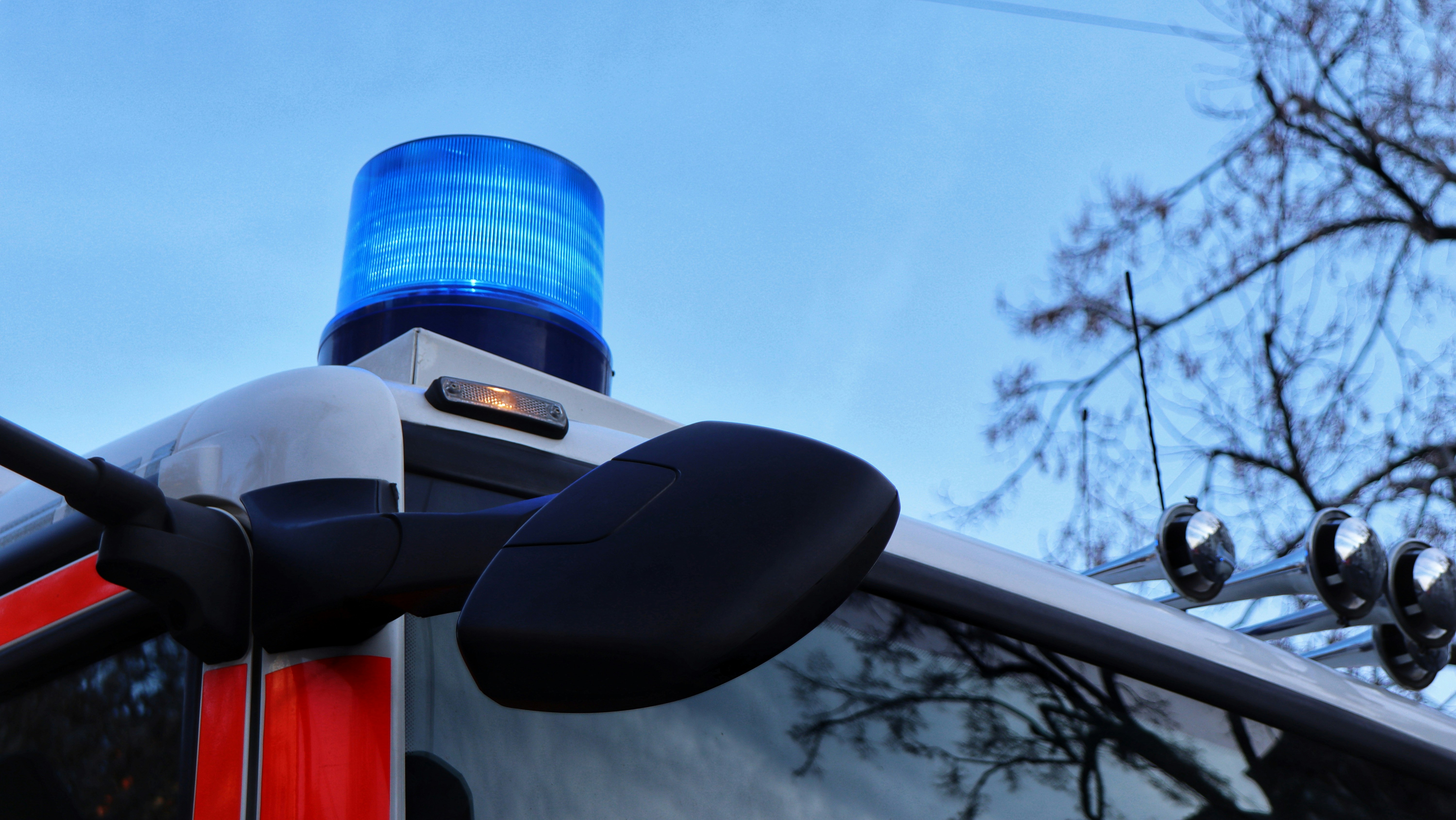a close up of a police car with its lights on
