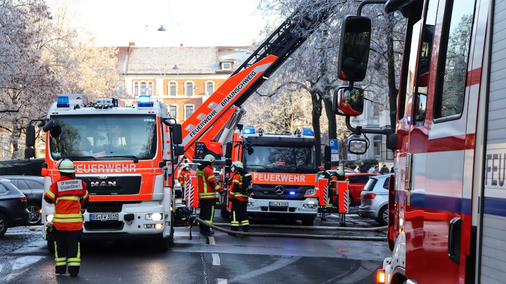 a couple of fire trucks parked next to each other