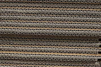 a close up of a stack of metal bars