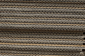 a close up of a stack of metal bars