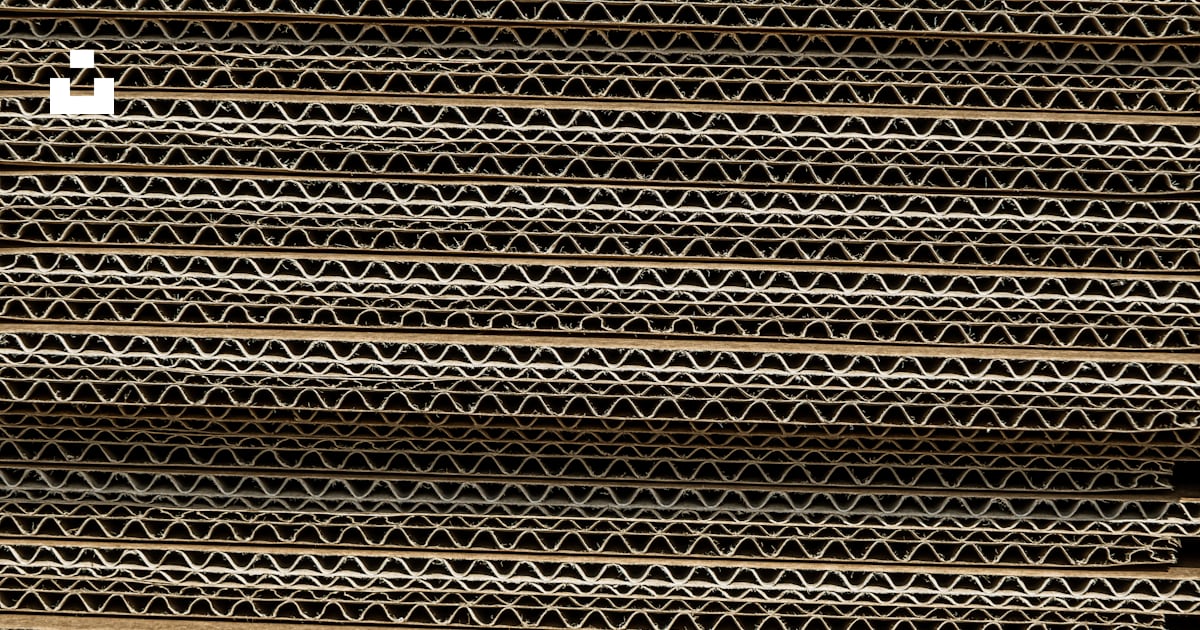 A close up of a stack of metal bars photo – Free Industry Image on Unsplash