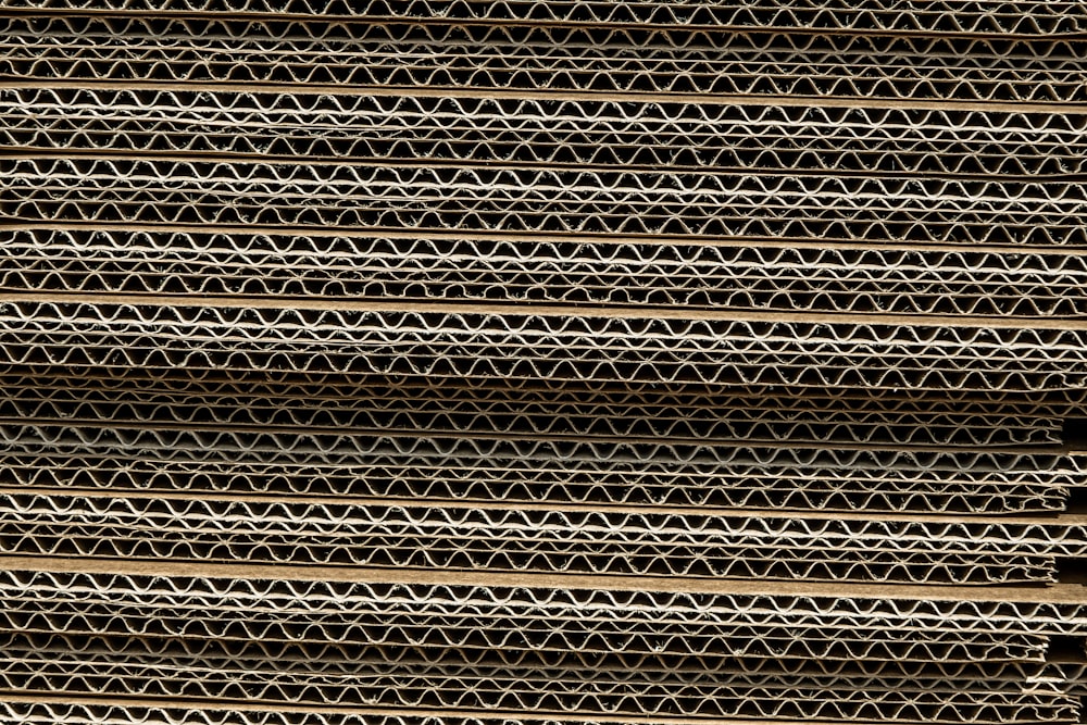 a close up of a stack of metal bars