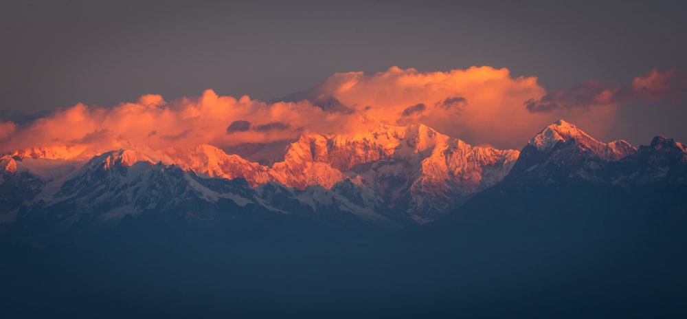 a view of a mountain range at sunset