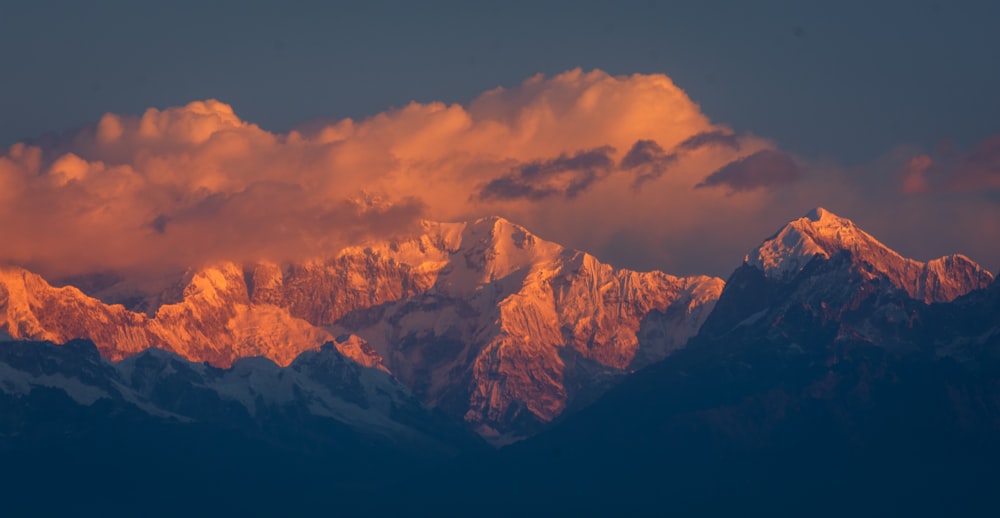 a view of a mountain range at sunset